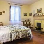 letto-appartamento-lilla-residence-villa valsi